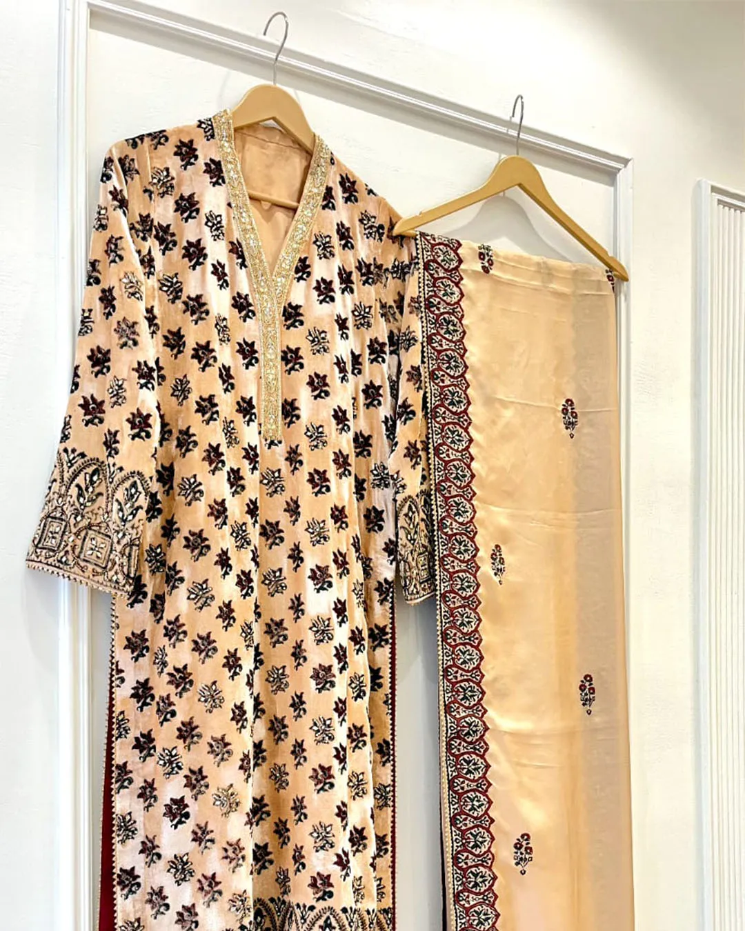 Untitled-1_0022_f3fe2ce6-722a-438d-9881-d2e7bdda84ea Peach Velvet Floral Booti Suit with Dabka Cuffs - Image 1