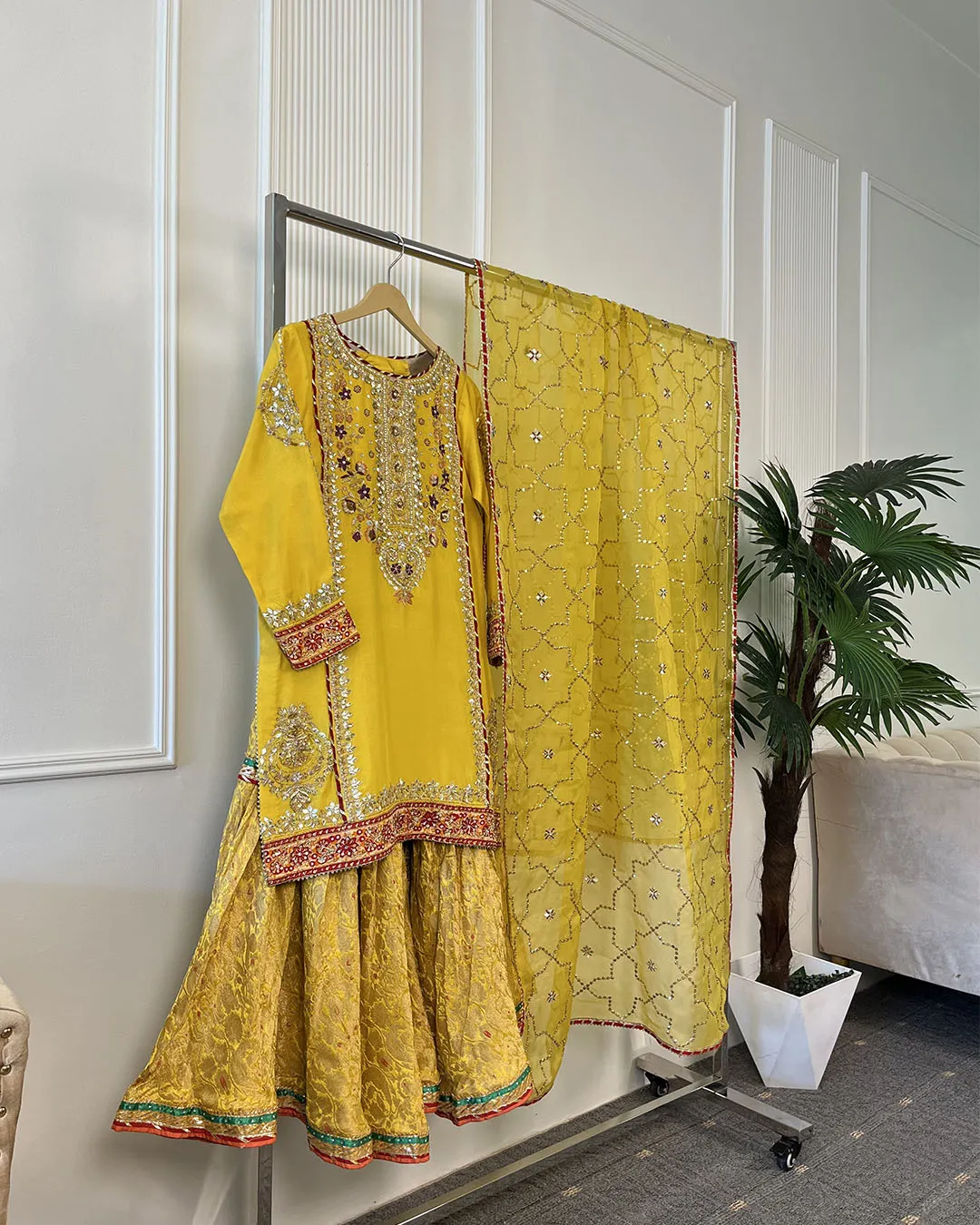 resize_0001_Document from subhan junejo (17) Pakistani bridal kurti with heavy zardozi floral embroidery, gota patti border and round neckline — yellow mehndi dress close-up