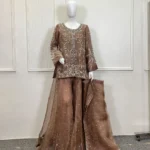 Full view of 3-piece brown organza Pakistani bridal sharara set on mannequin showing heavily embroidered kurti, wide flared sequin sharara and matching dupatta