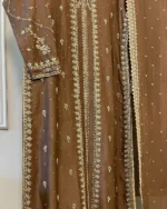 Brown Pakistani shalwar trouser with heavy gold floral lace border at hem bridal suit detail