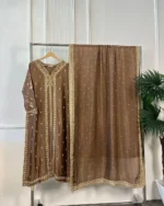 Full view of 3-piece brown Pakistani bridal suit with gold embroidered kurti and pearl dot dupatta on clothing rack