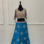 Teal Blue Lehenga with Zardozi Choli And Tassel Latkans